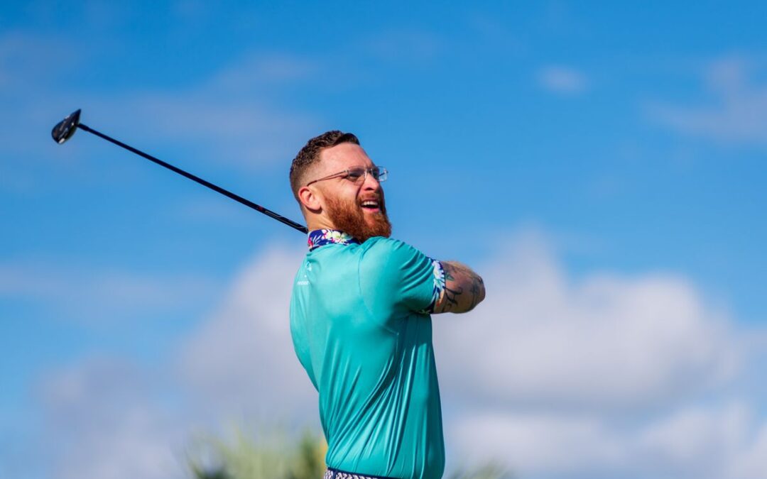 Man playing golf