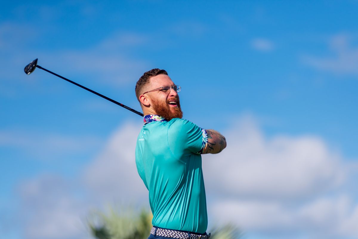 Man playing golf